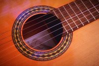 brown acoustic guitar